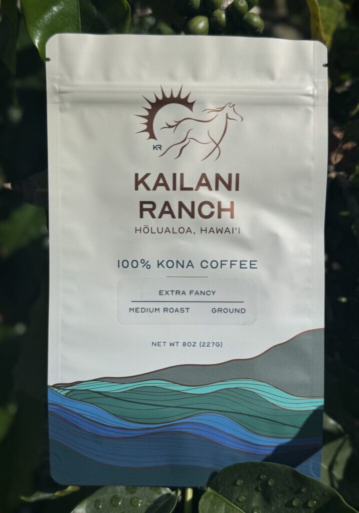 Kailani Ranch Kona Coffee package amidst foliage.